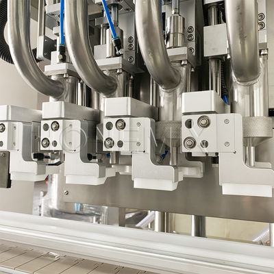 Machine de remplissage de crème à quatre têtes à traçage de servo-piston