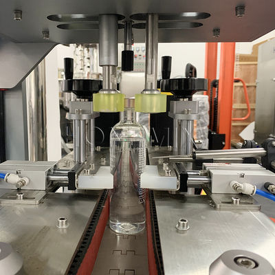 Machine de remplissage et de fermeture de bouteilles d'huile liquide personnalisée