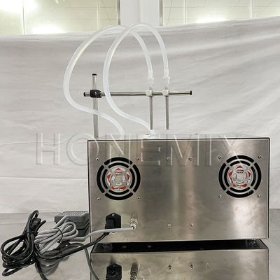Machine de remplissage de petites bouteilles à double tête en plastique