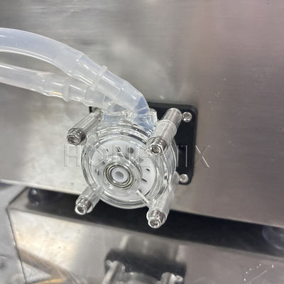 Machine de remplissage de bouteilles d'huile liquide