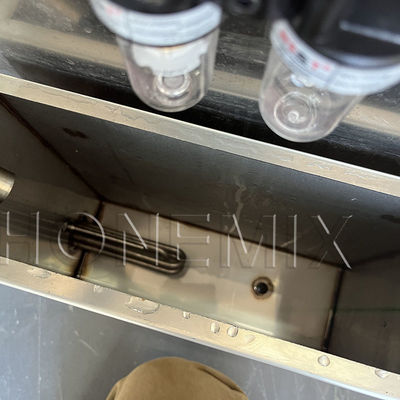Machine de remplissage de baume à chaleur cosmétique, machine de remplissage verticale semi-automatique