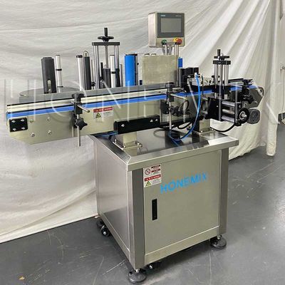 Machine d'étiquetage automatique à autocollants verticaux sur mesure pour bouteille ronde