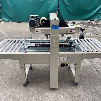 220V / 50HZ machine d'emballage automatique 12mm carton boîte scellante du ruban adhésif