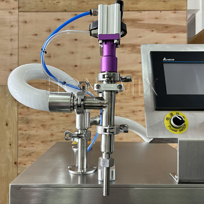 Machine de remplissage semi-automatique de flacons de savon liquide et de bouteilles de parfum