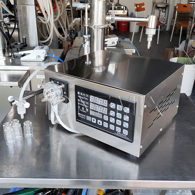 Machine de remplissage de bouteilles d'huile liquide pompe péristaltique semi-automatique
